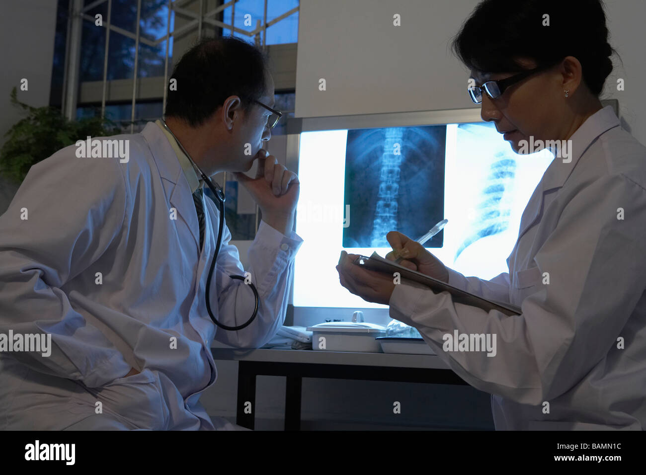 Doctors Looking At XRays Stock Photo Alamy