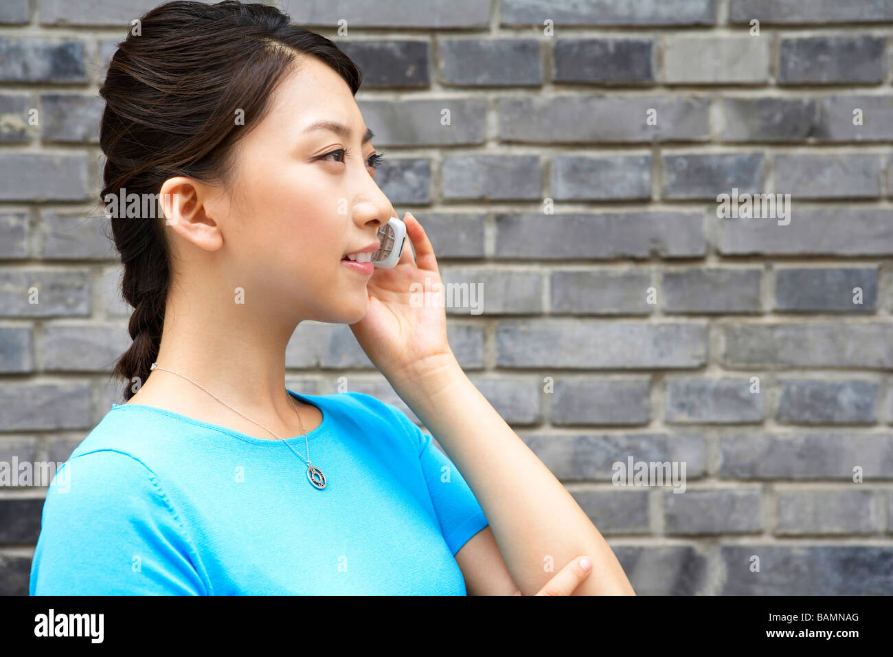 Young Woman Talking On Cellphone Stock Photo