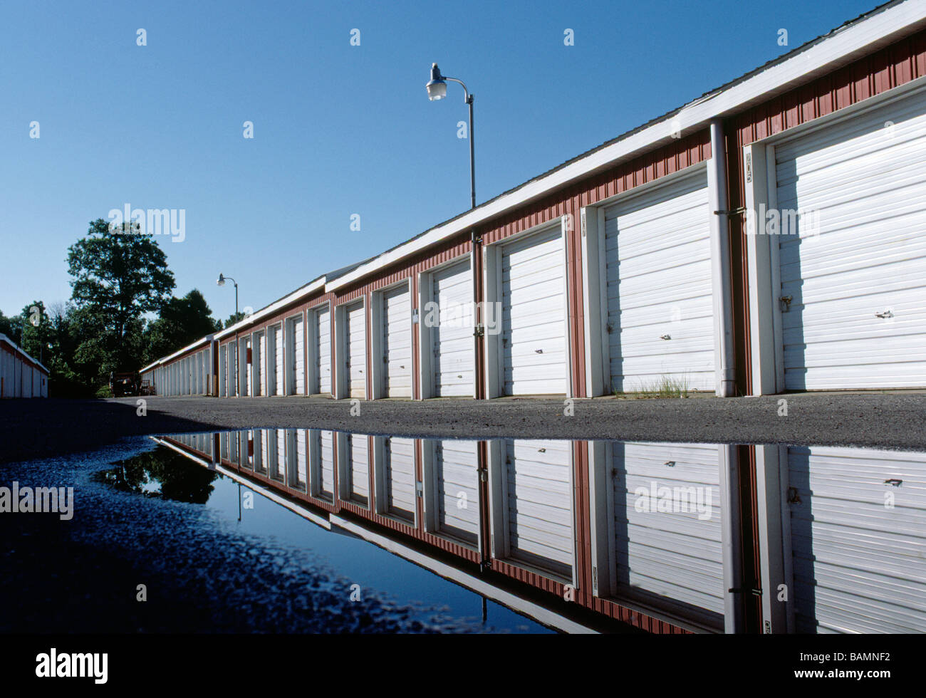 Garage like rental storage units lined up in a row Stock Photo Alamy