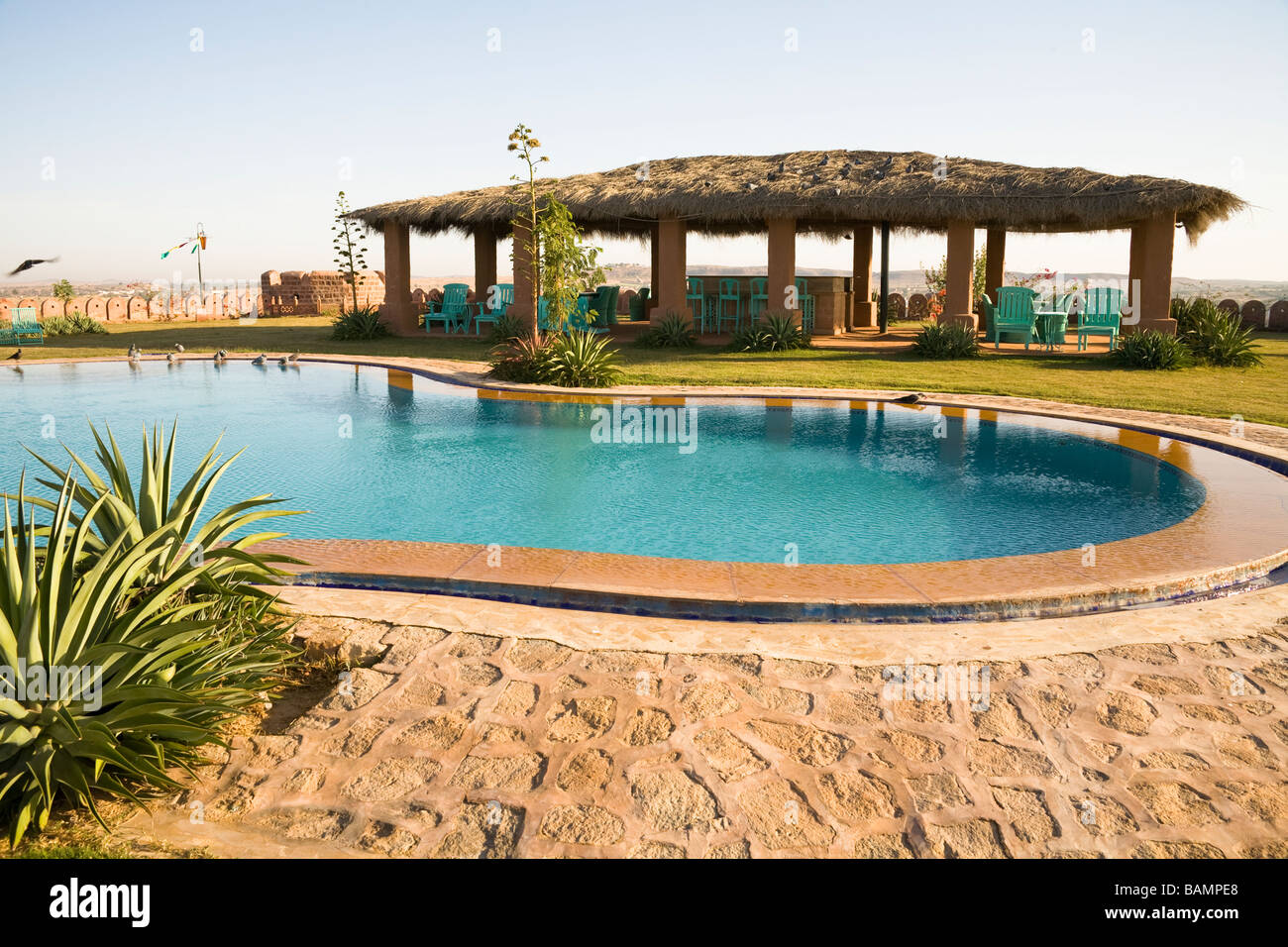 Swimming pool and terrace at Osian Camel Camp, Osian, Rajasthan, India Stock Photo