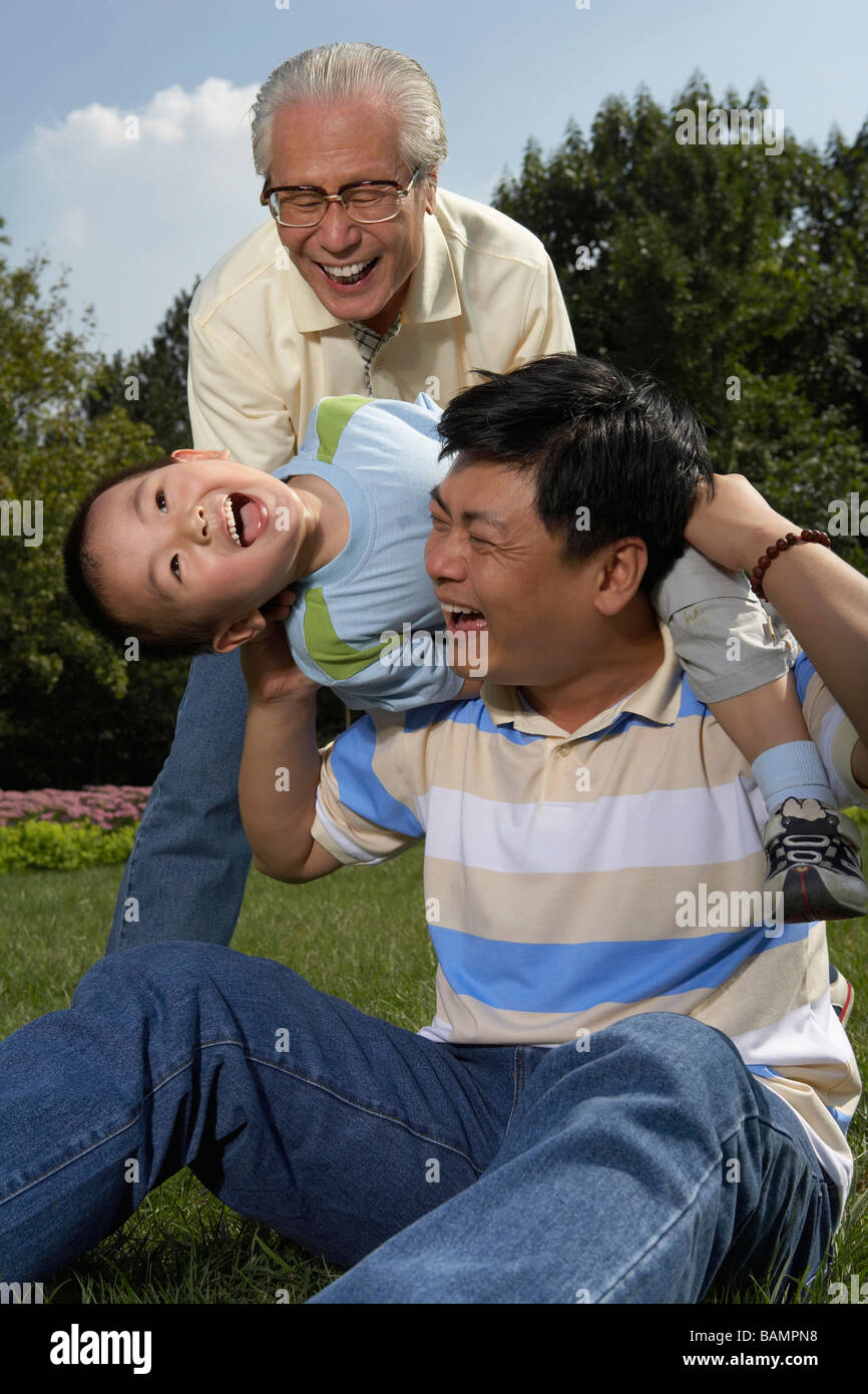 Portrait Of Family In The Park Stock Photo - Alamy