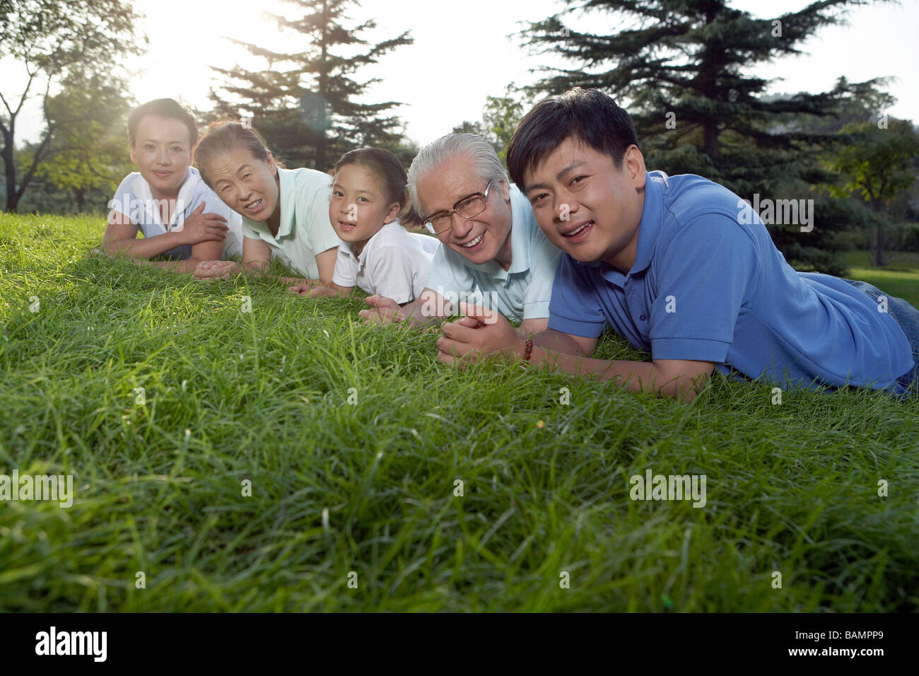 Group children lying on grass hi-res stock photography and images - Alamy