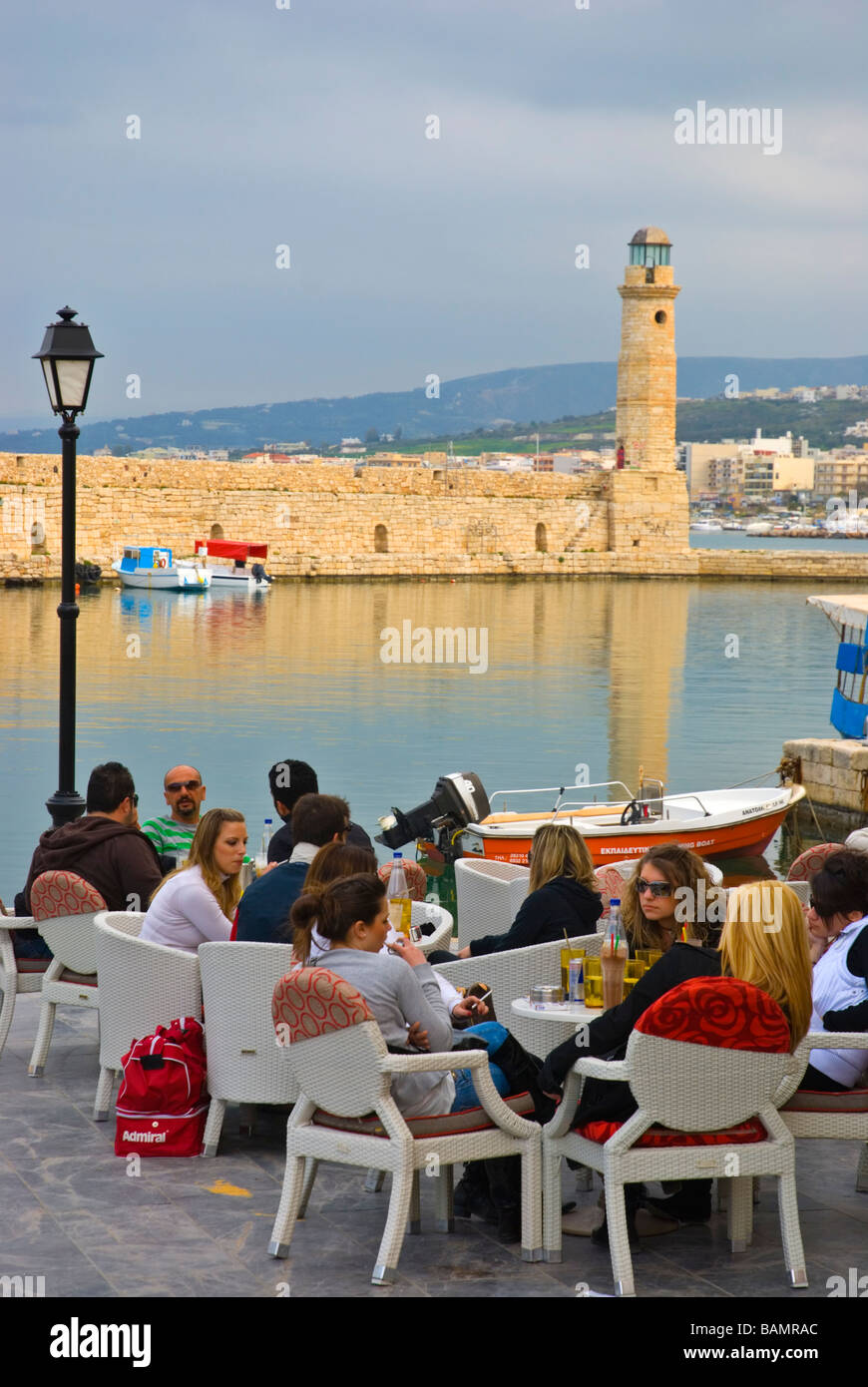Cafe terrace at Venetian port in Rethymno Crete Greece Europe Stock Photo