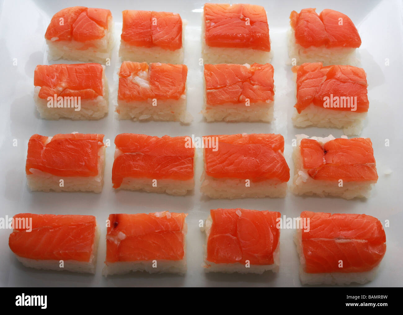 Salmon Nigiri Sushi On A A White Dish Stock Photo Alamy