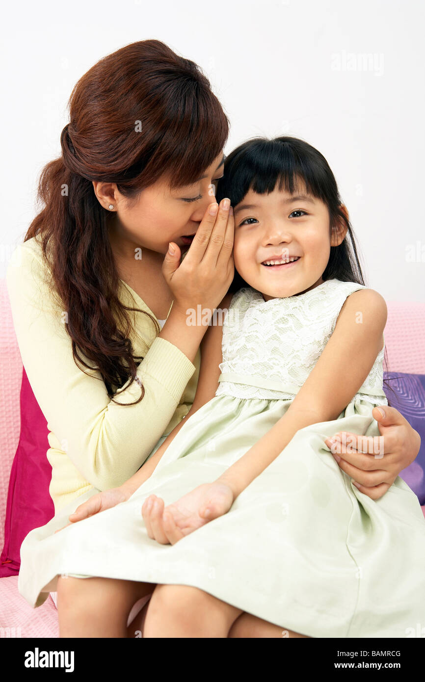 Mother And Daughter Sharing Secrets Stock Photo Alamy