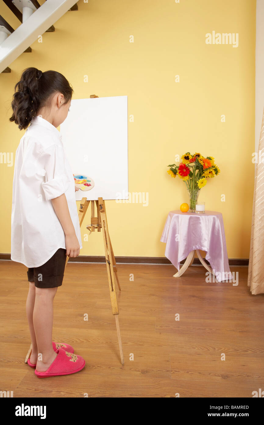 Girl With Easel Stock Photo - Alamy