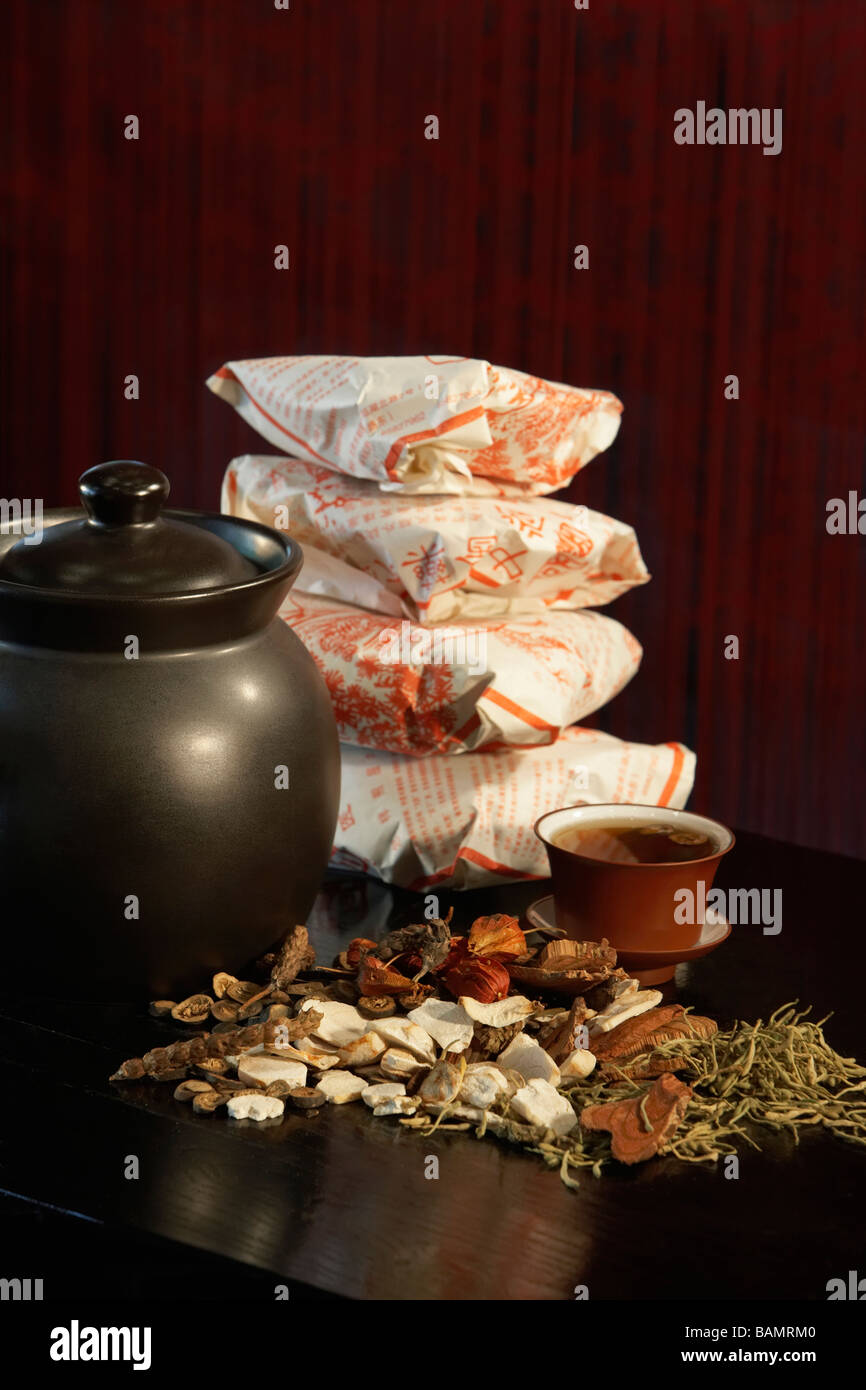 Teapot, Tea Leaves And Wrapped Packages Stock Photo Alamy