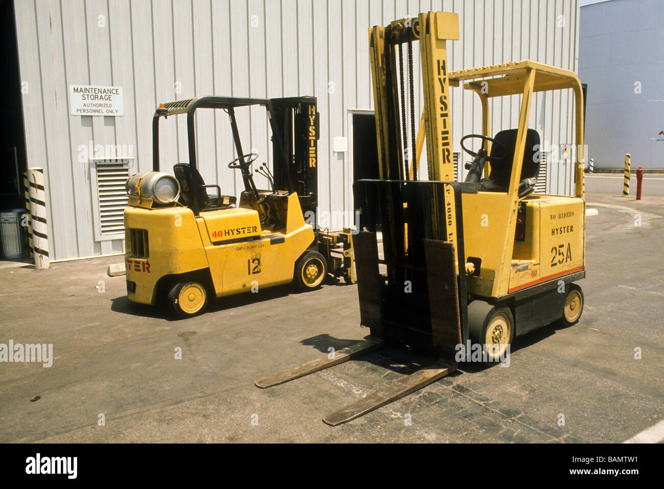 Yellow fork lift machine carry store stack handle ship cargo move lift ...