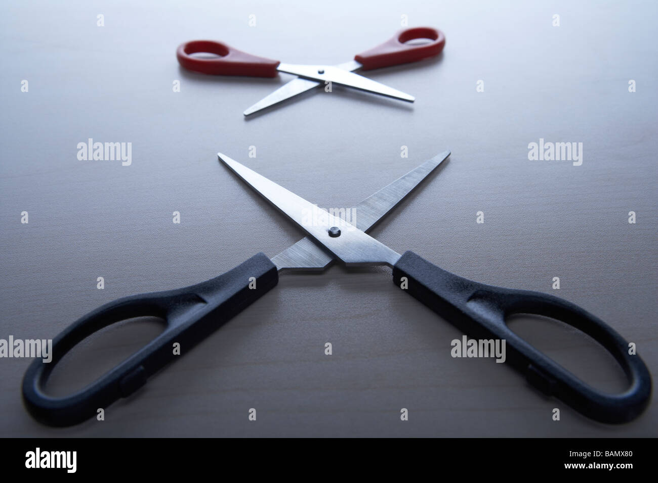 Two pairs of scissors open and facing each other stock photo alamy