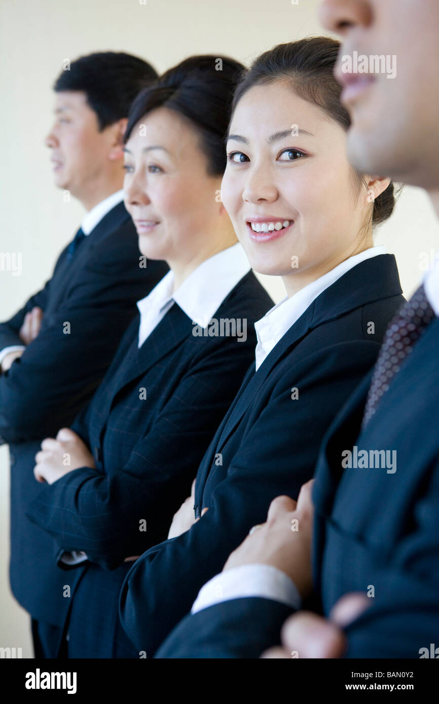 Asian business team smiling joining hi-res stock photography and images ...
