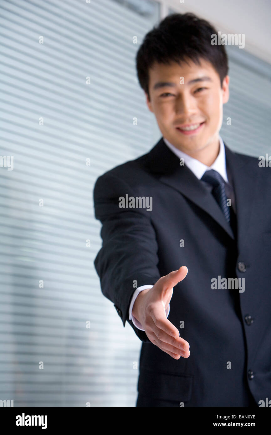 Extend Handshake Extending a Handshake Stock Photo - Alamy