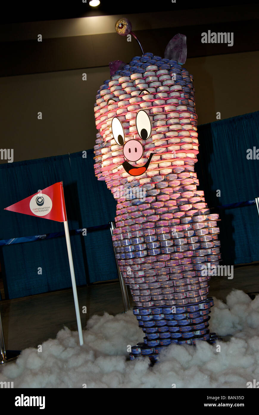 Canstruction charity event pig sculpture made from tins of donated canned food that will be given to the Vancouver Food Bank Stock Photo