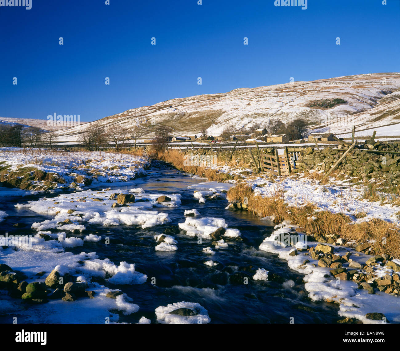 the river skirfare running through littondale by the village of halton gill in wintertime yorkshire dales uk Stock Photo
