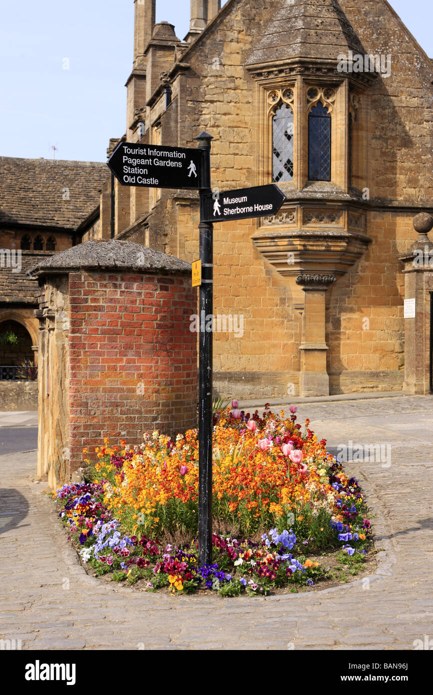 A tourist information sign giving directions to local places of