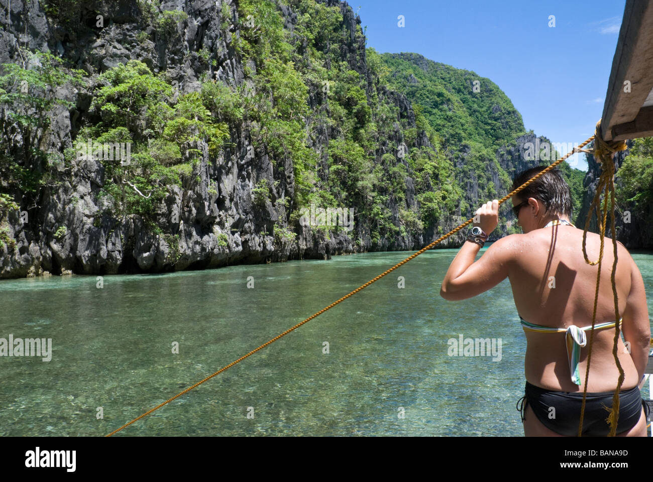 Tourists on an island hopping trip through the Bacuit Archipelago, Palawan, Philippines Stock Photo