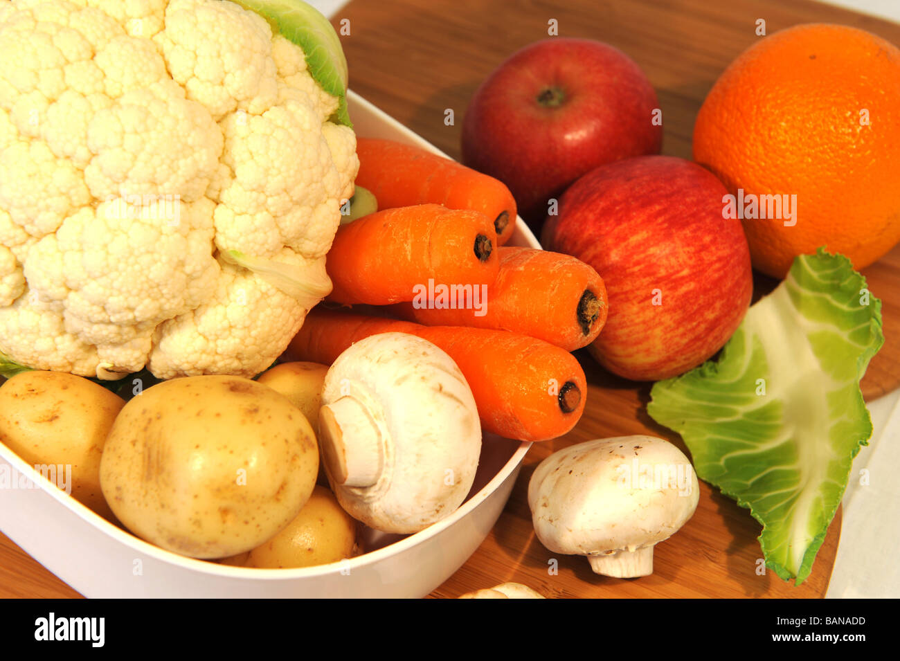 A colourful selection of seasonal fruit and vegetables - healthy eating - five a day Stock Photo