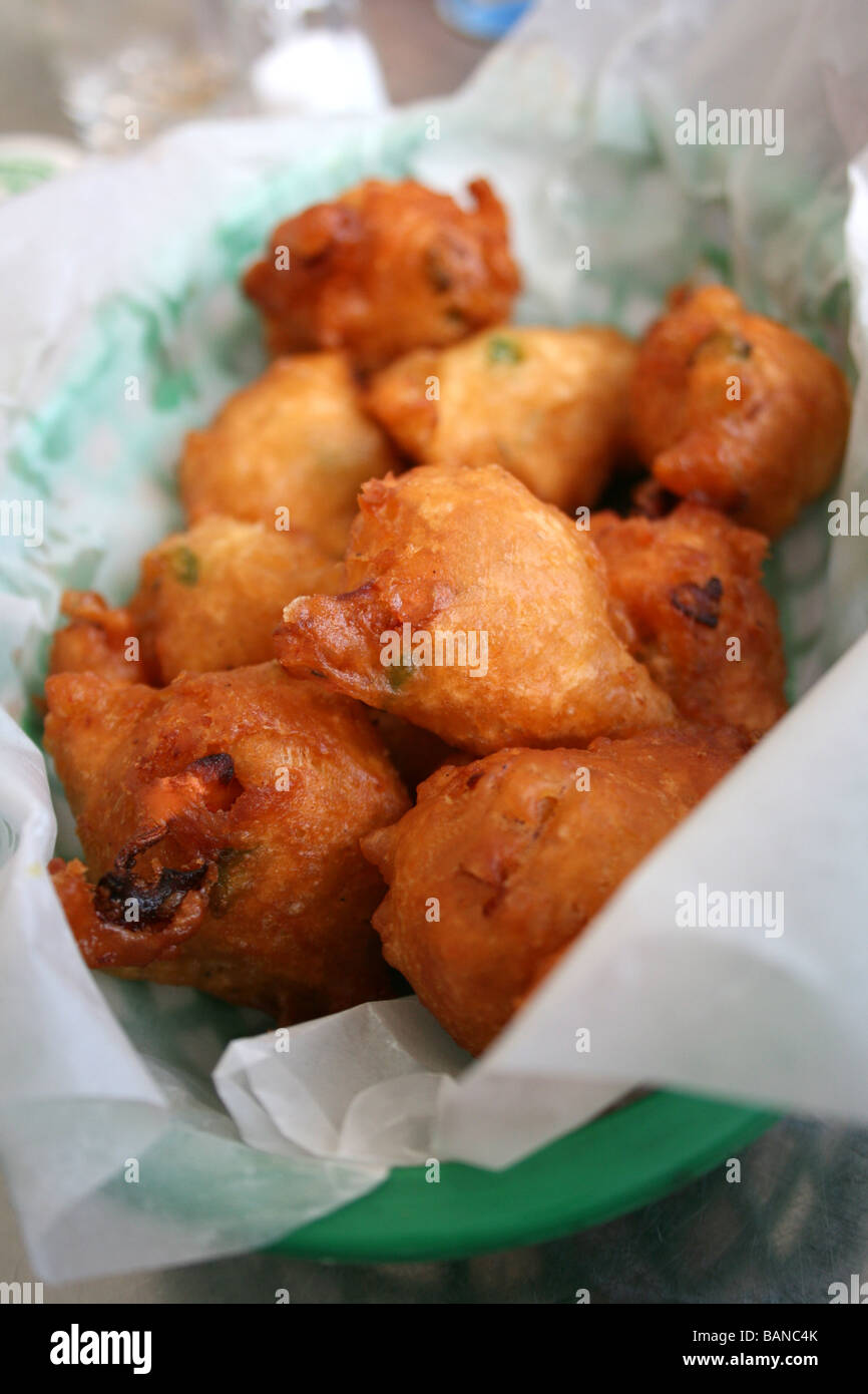 a basket of conch fritters, popular Bahamian cuisine, fried conch, Bahamas Stock Photo