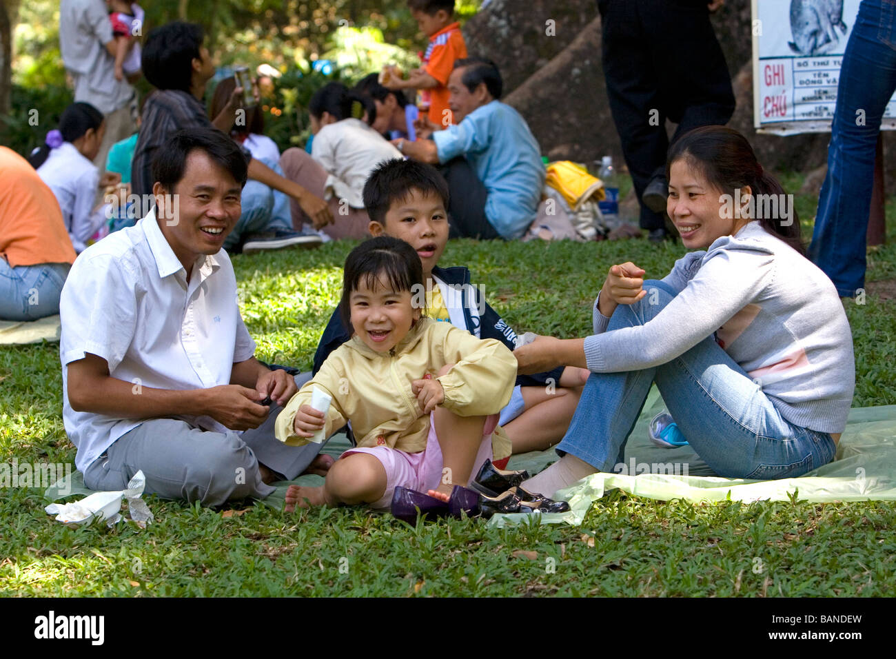 Vietnamese family at the Saigon Zoo and Botanical Gardens in Ho Chi Minh City Vietnam Stock Photo