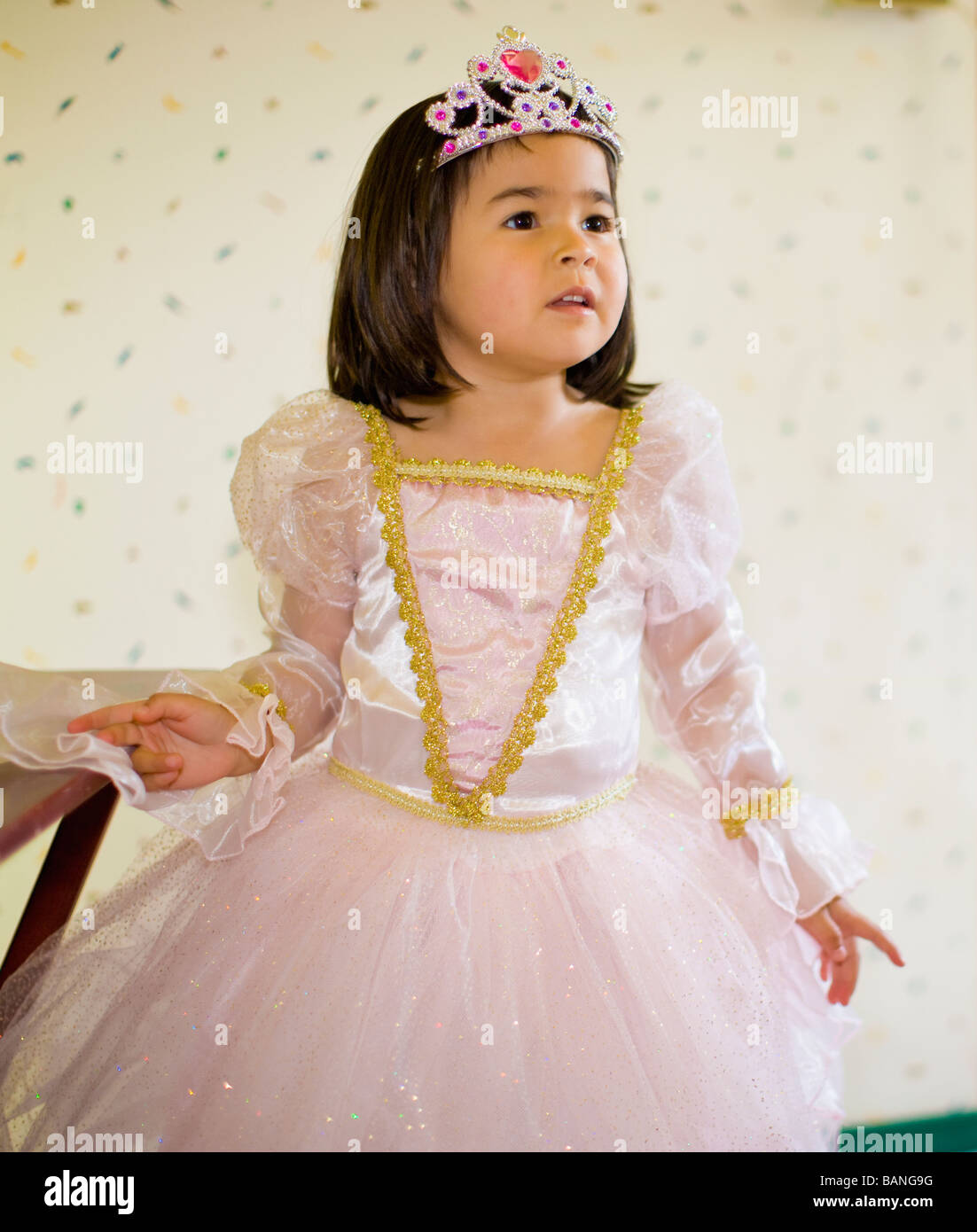 Young girl (aged 5) dressing up as a princess Stock Photo - Alamy