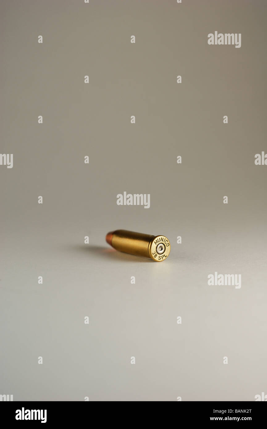 A .38 special bullet laying on its side on white background Stock Photo