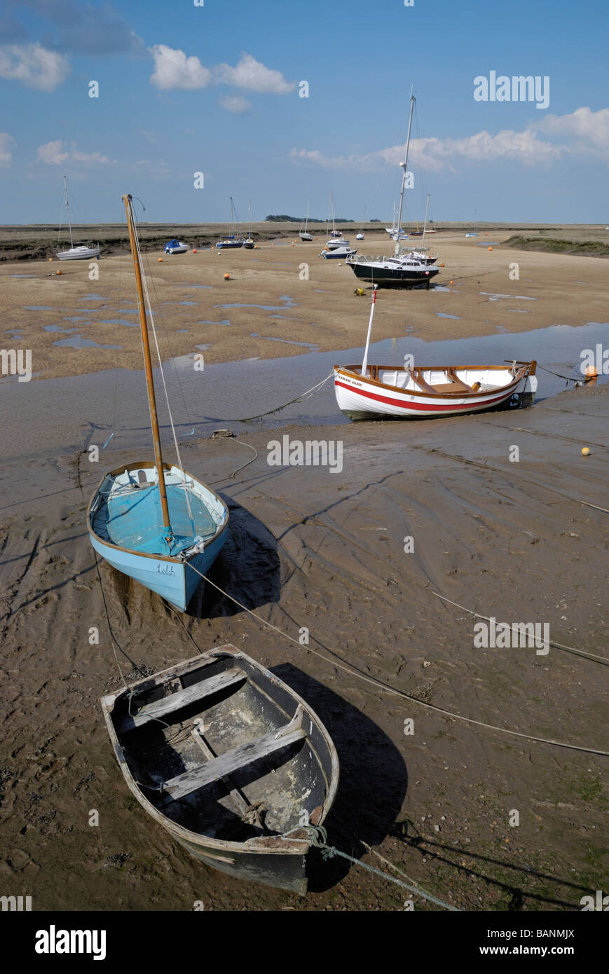 Boats at low tide, Wells-next-the-Sea, Norfolk, England. Stock Photo