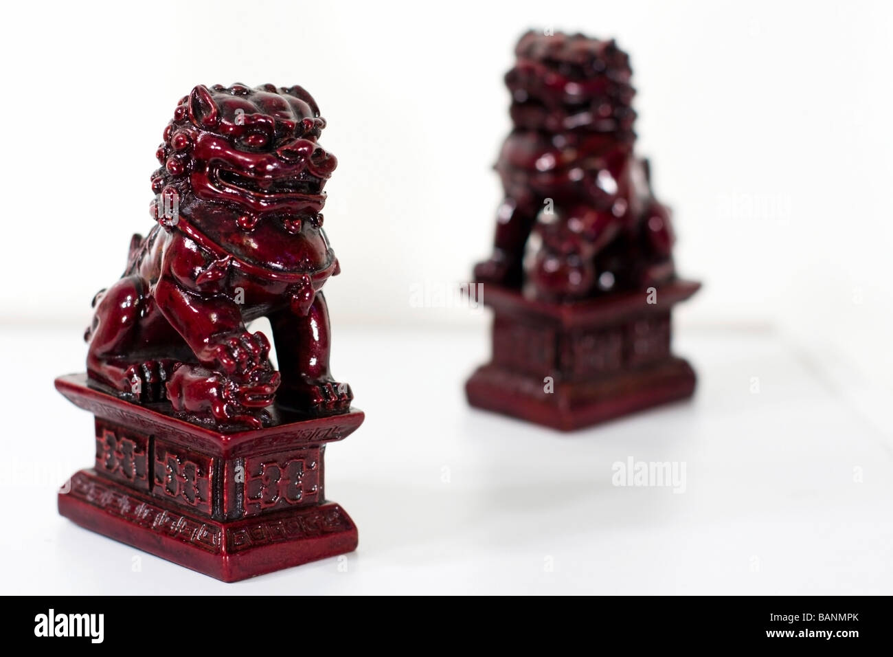 Chinese lions; Figurines of lions believed to have mythic protective powers in Chinese mythology Stock Photo