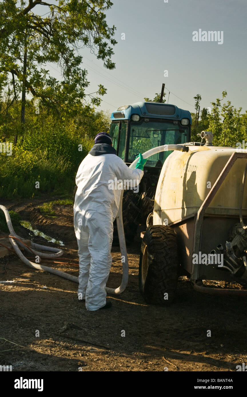 Agricultural worker wearing protective clothing. Stock Photo