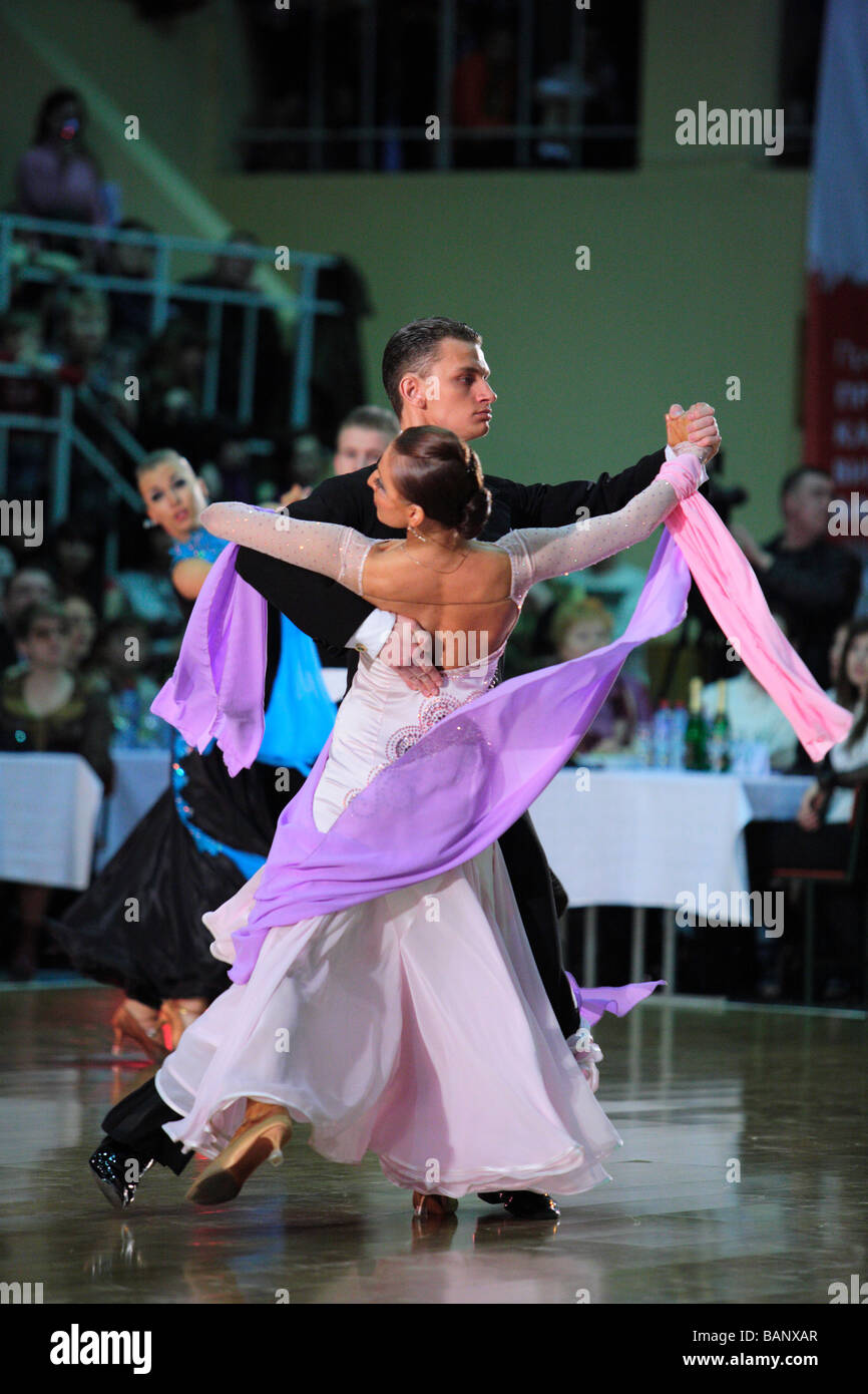 Professional ballroom dancers performing in the Standard Dance ...