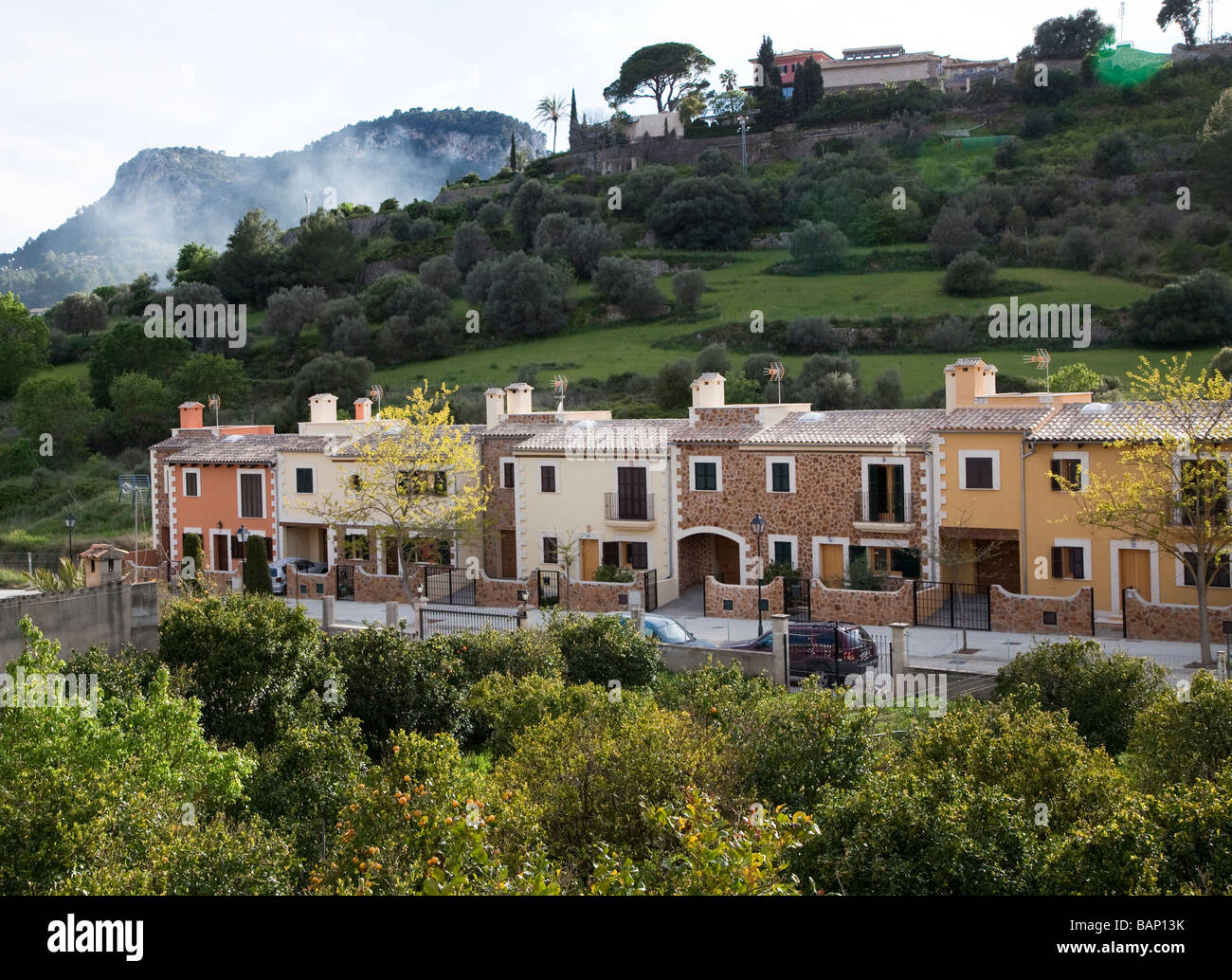 Modern terraced houses built in traditional style of local homes Puigpunyent Mallorca Spain Stock Photo