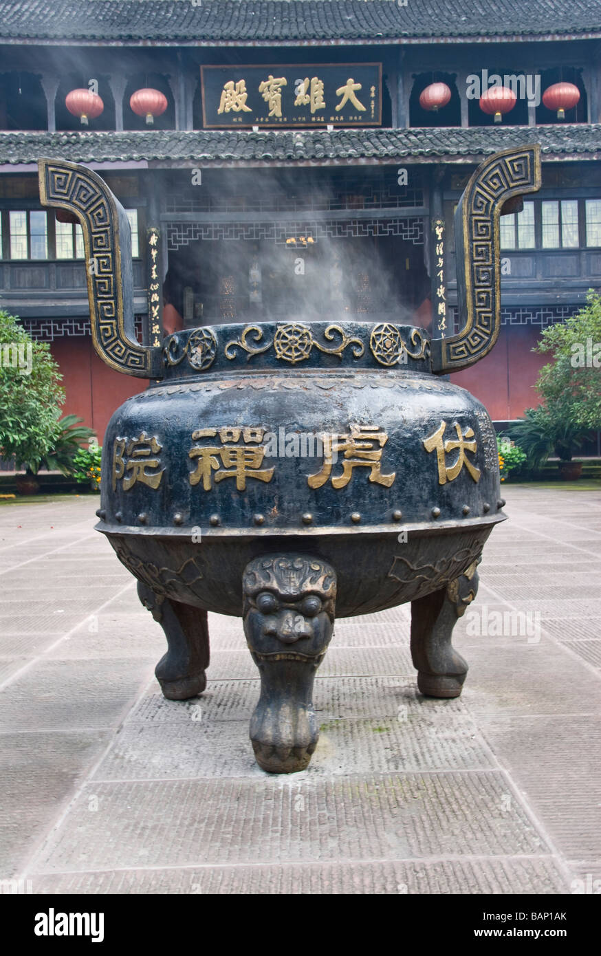Incense burning in one of temples at the Mount Emei Shan national park