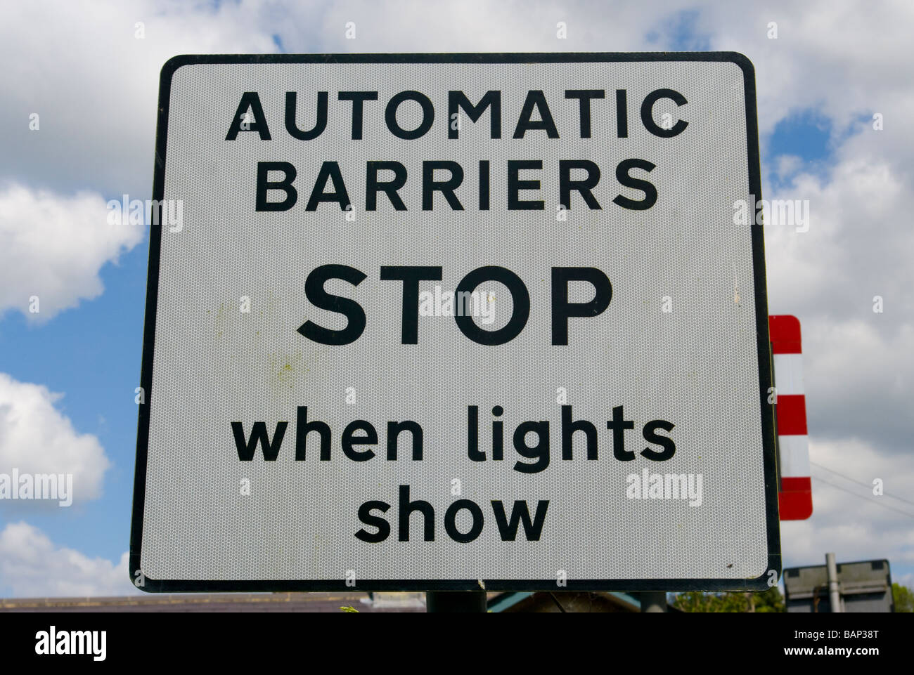 Automatic Barriers Stop When Lights Show Road Sign uk english Road traffic Sign Stock Photo