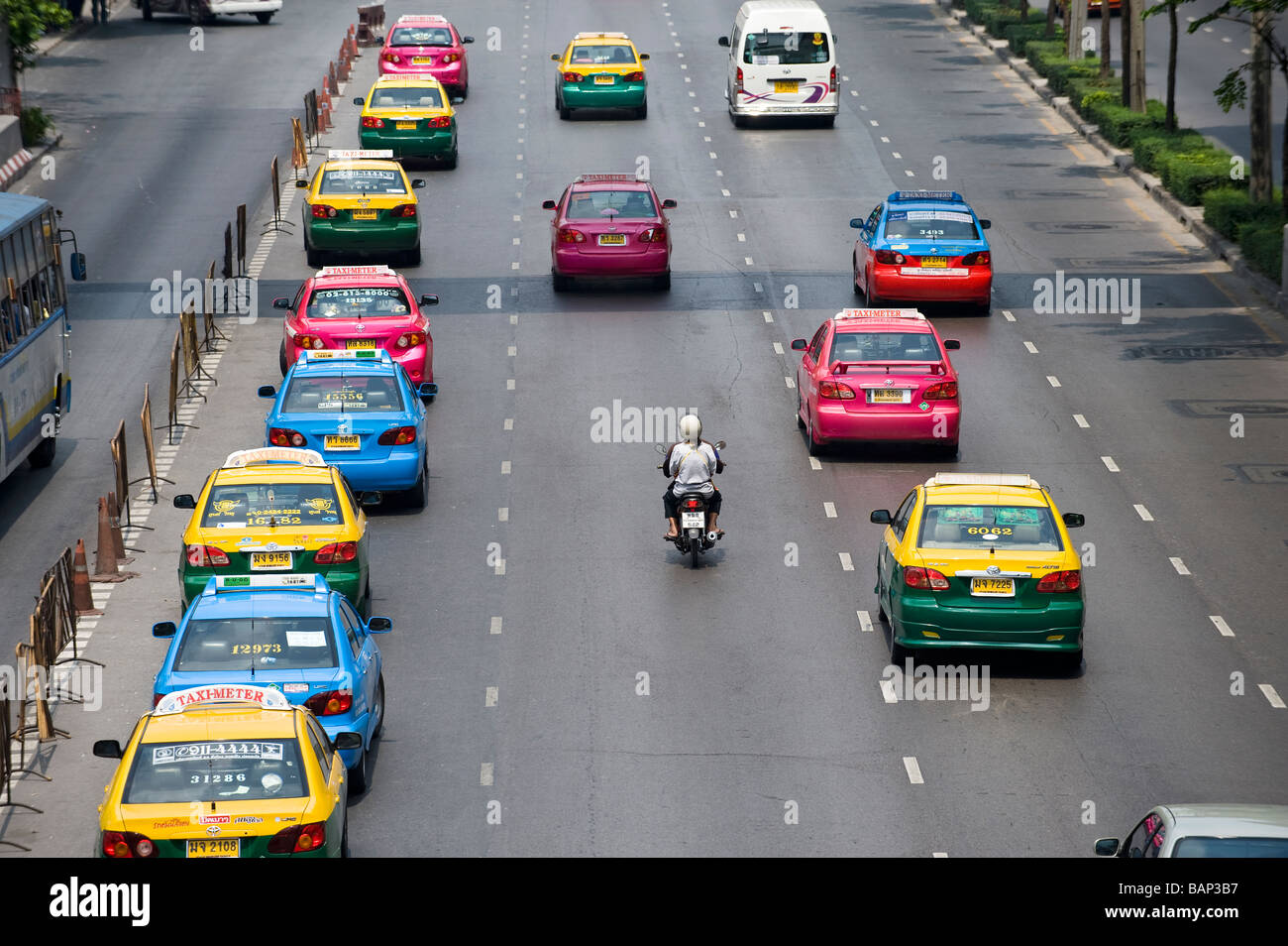 Colourful Taxis and Traffic near Chatuchak Weekend Market. Bangkok, Thailand. Stock Photo