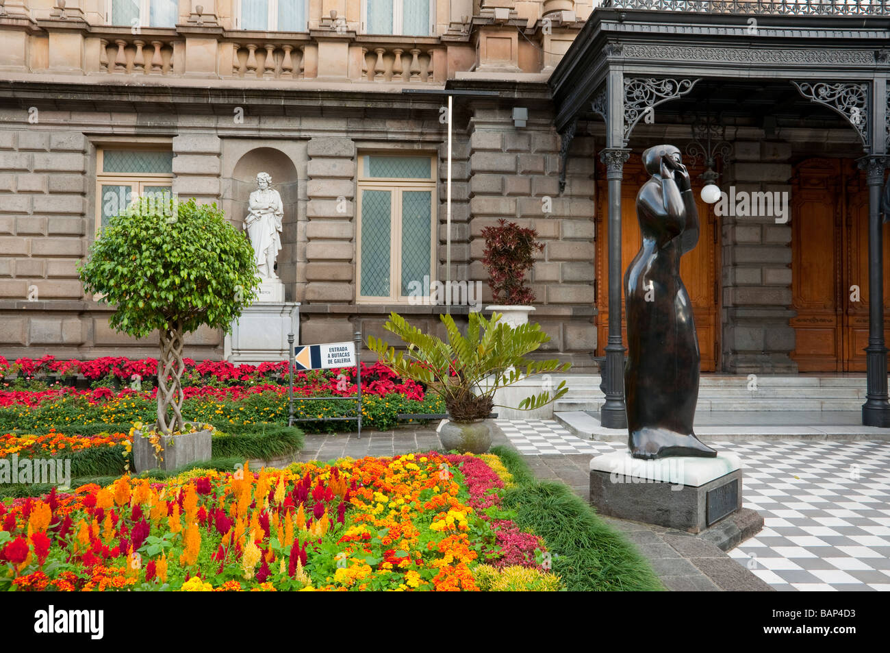 The exterior flower gardens of the National Theater building in San Jose Costa Rica Central America Stock Photo
