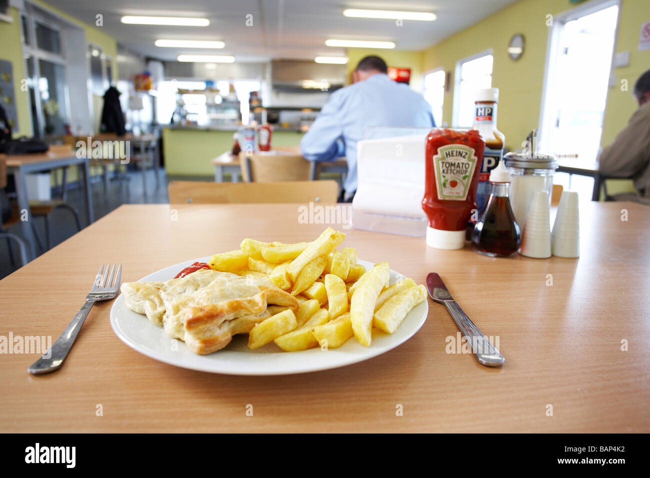 Plate of Pasty and chips in a works canteen Stock Photo Alamy