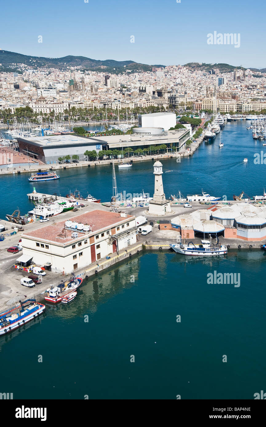 Port Vell Clock Tower and Maremagnum commercial center Barcelona Catalonia Spain Stock Photo