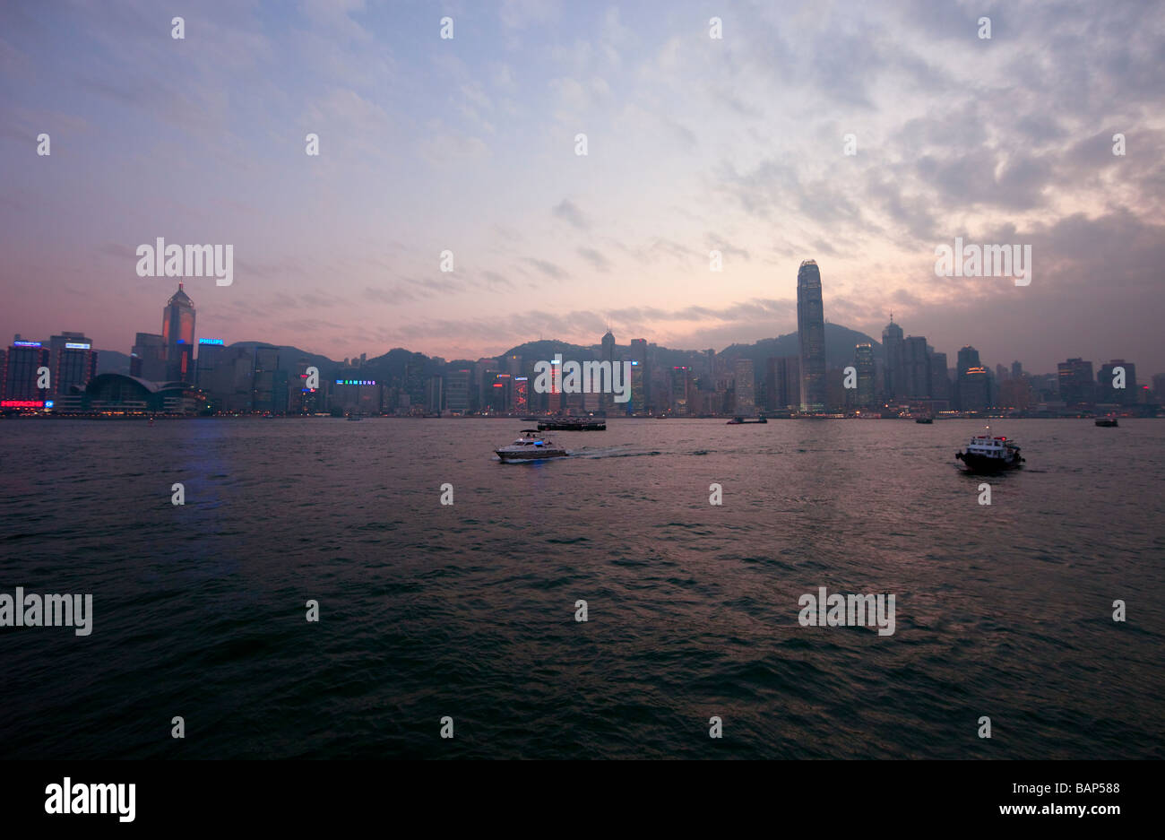 Skyline of Hong Kong at Dusk - Central Plaza and Two IFC on Hong Kong Island, China, Asia Stock Photo