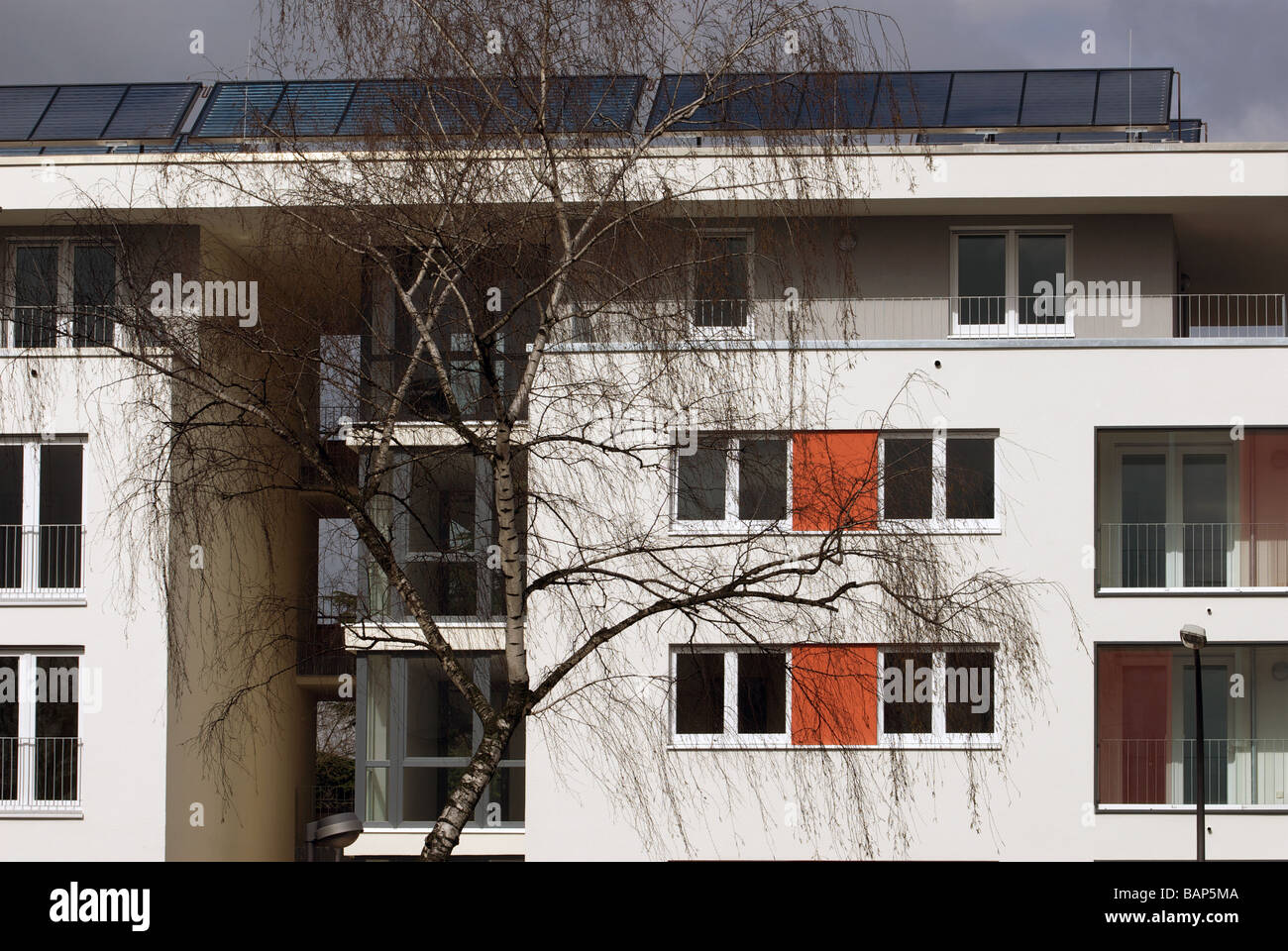 View of Newly built apartments with built-in solar energy panels fitted to the ...