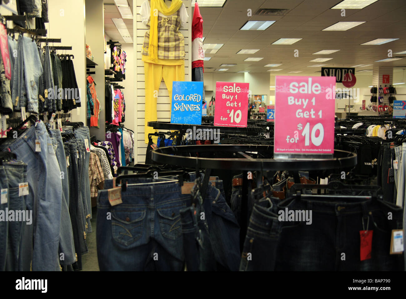 Jeans and various other clothing on sale at a store marketing to teens and twentysomethings Stock Photo