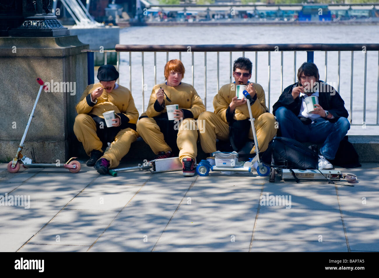The South Bank , London , the three wise monkeys Young boys in costume