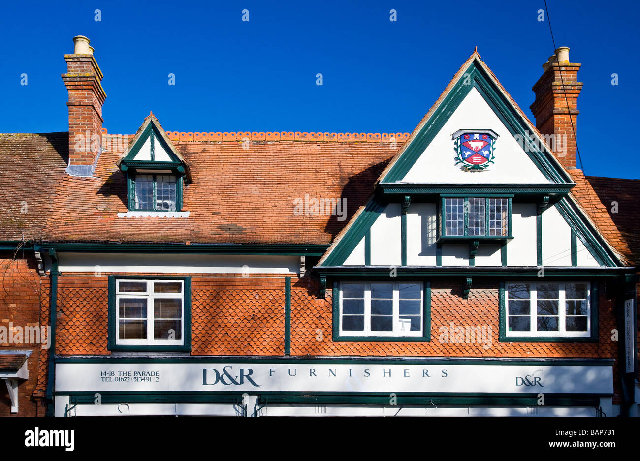 A Half Timber Framed House With Dormer And Oriel Windows And