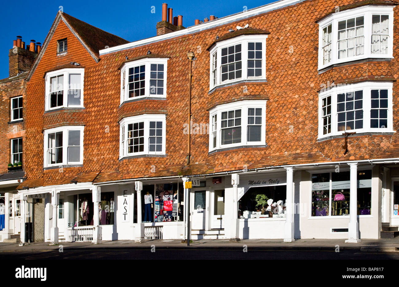 Georgian shops in the High Street in the typical English market town of Marlborough Wiltshire England UK Stock Photo