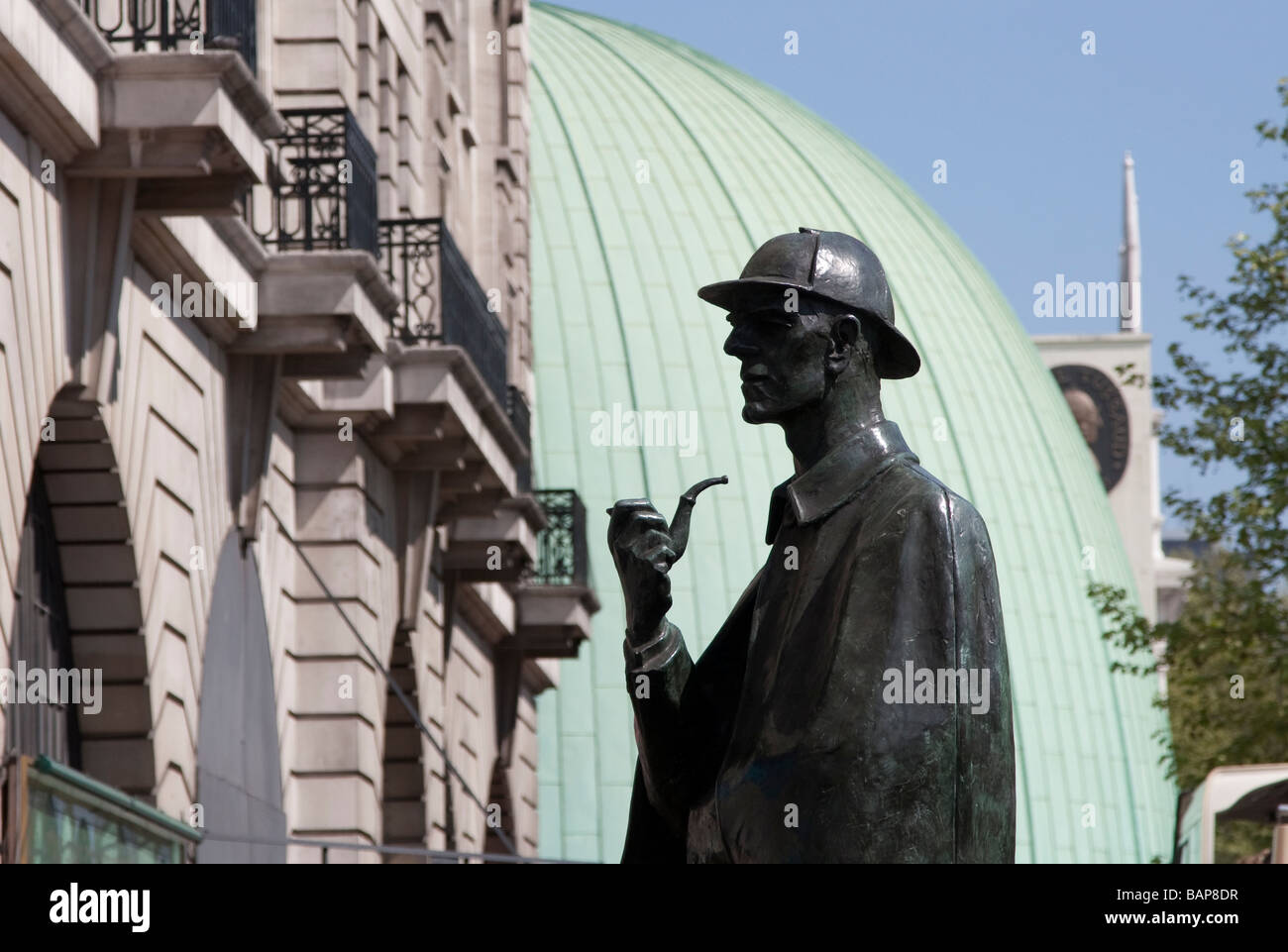 statue of Sherlock Holmes Baker Street Station London and the dome of Madame Tussauds Stock Photo