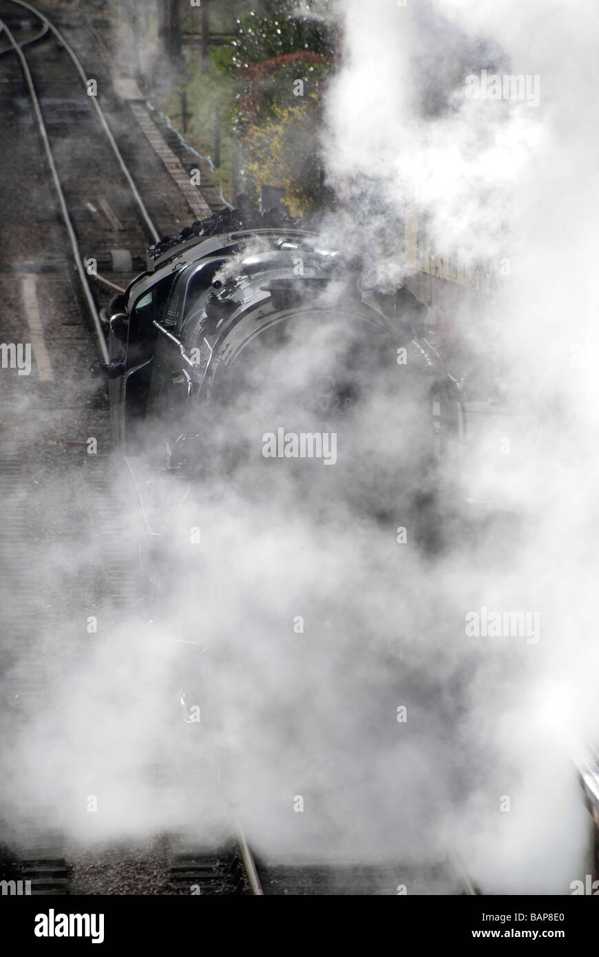 Steam engine letting off steam, West Somerset steam railway station, Bishops Lydeard, Somerset. Stock Photo