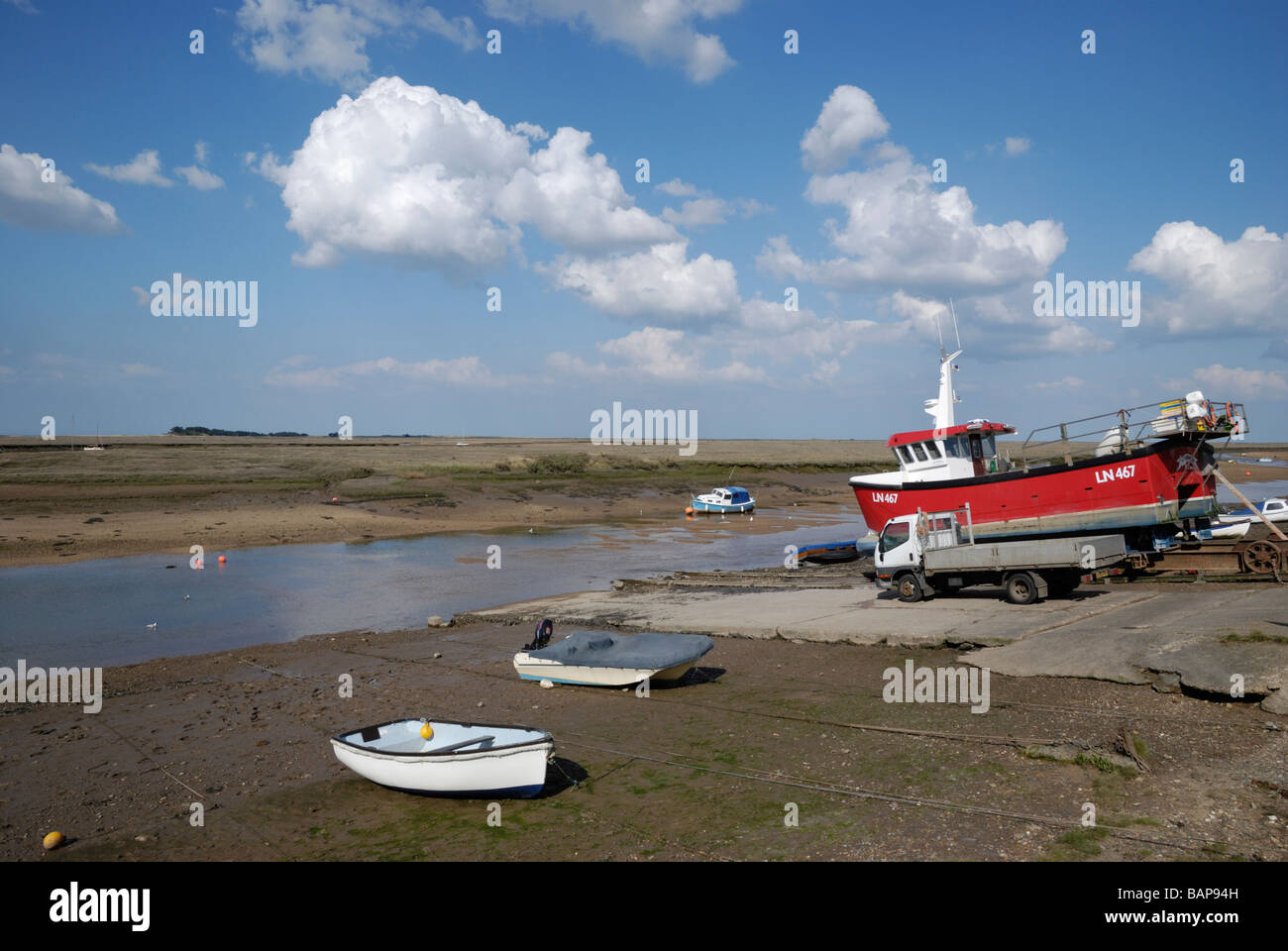 Boats at low tide, Wells-next-the-Sea, Norfolk, England. Stock Photo
