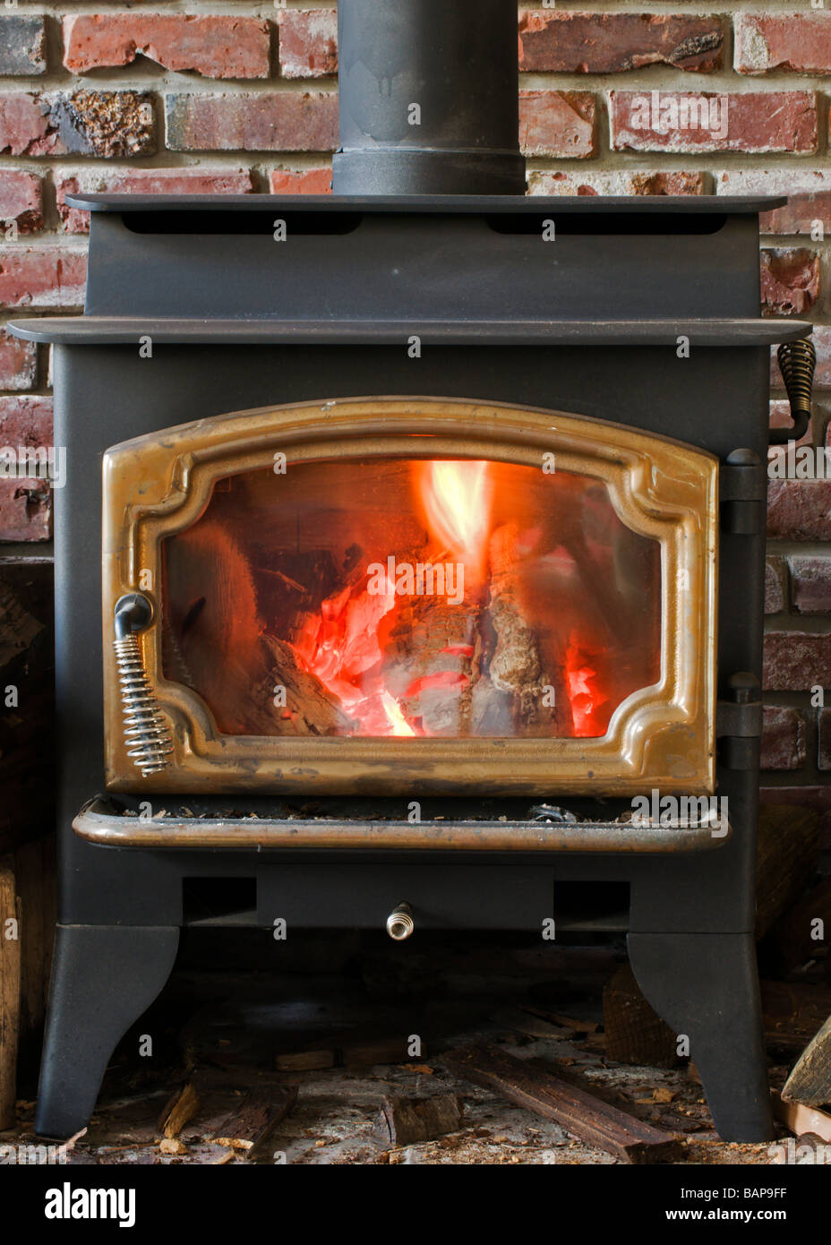 Burning firewood in rustic brick hi-res stock photography and images ...