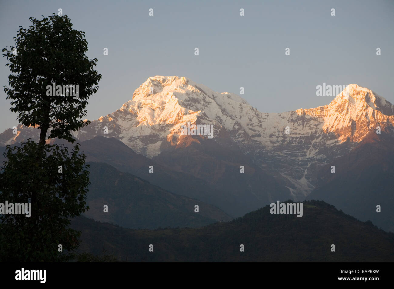 Sunset view to Annapurna South and Hiunchuli Stock Photo