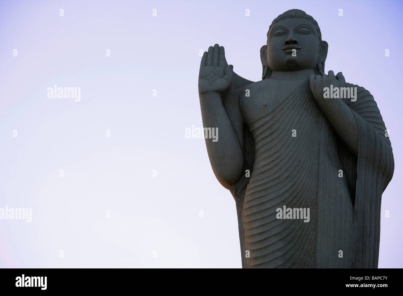 Low angle view of a statue of Buddha, Hussain Sagar, Hyderabad, Andhra Pradesh, India Stock Photo