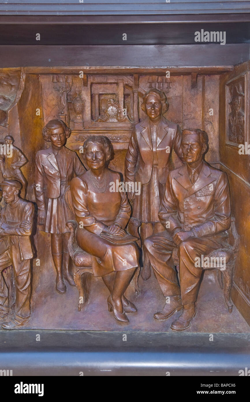 Bronze frieze panel detail by Paul Day of life of Queen Elizabeth , Queen Mother , 1900 - 2002 , with King George VI & daughters Stock Photo