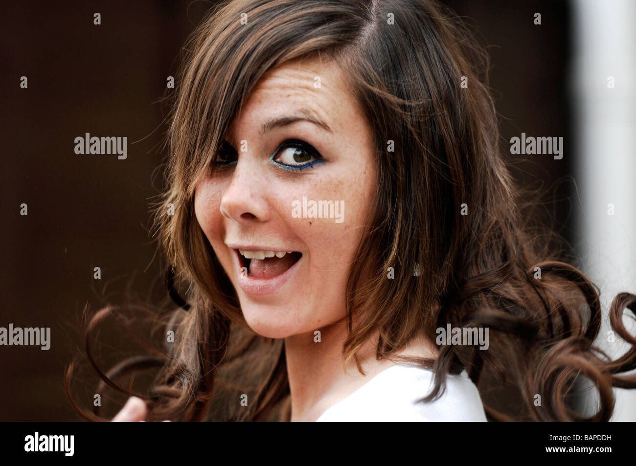 Attractive Brunette Young Woman Wearing Balmain Hair Extensions