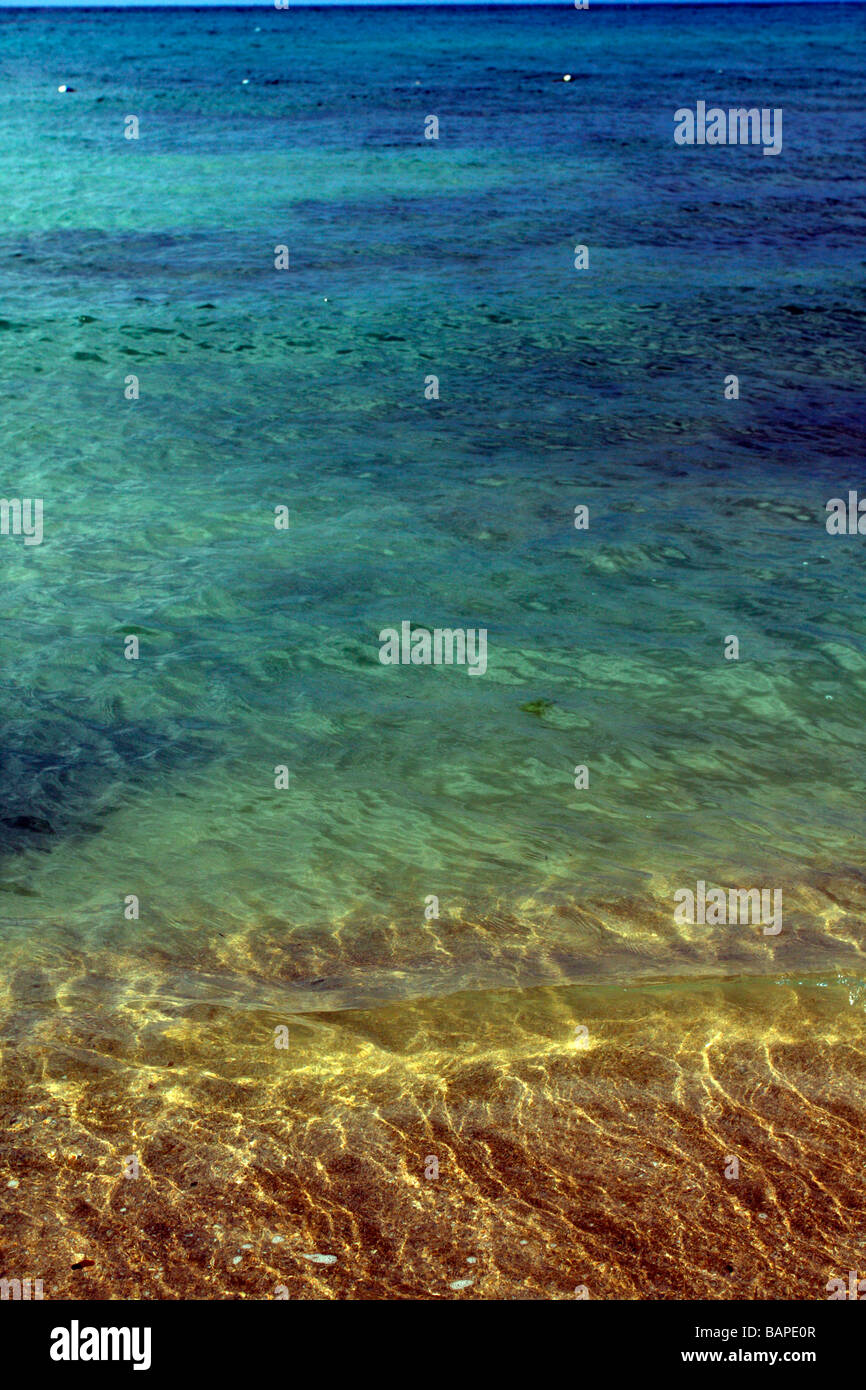 Water at the beach line in Runaway Bay, Jamaica. Stock Photo